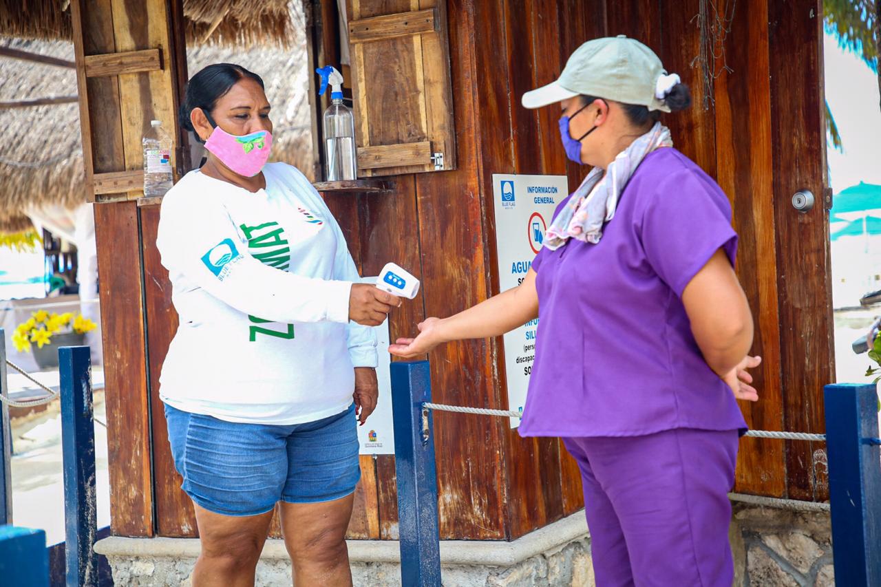 Mantienen estrictos protocolos sanitarios en playas de Isla Mujeres